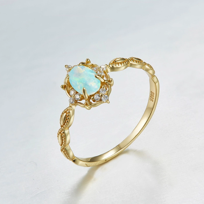 Delicate opal birthstone golden ring 2